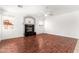Spacious living room featuring a fireplace and hardwood floors at 1344 N Constellation Way, Gilbert, AZ 85234