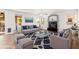 Cozy living room features a fireplace, comfortable seating, and natural light at 1344 N Constellation Way, Gilbert, AZ 85234