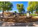 Playground featuring modern slides and climbing structures, set in a safe and enjoyable community recreational area for children at 1344 N Constellation Way, Gilbert, AZ 85234