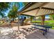Community playground featuring slides, climbing structures, and picnic tables, perfect for Gathering fun and outdoor gatherings at 1344 N Constellation Way, Gilbert, AZ 85234