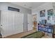 Bedroom featuring a large closet, a bookshelf, and plush carpeting at 1391 E Angie St, Casa Grande, AZ 85122