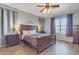 Calming bedroom with elegant furniture, ceiling fan, and natural lighting at 1391 E Angie St, Casa Grande, AZ 85122