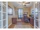 Home office with built-in desk and storage in a well-lit, comfortable setting at 1391 E Angie St, Casa Grande, AZ 85122