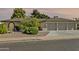 Charming single-story home featuring a two-car garage and low-maintenance desert landscaping at 1508 W Kiowa Ave, Mesa, AZ 85202