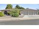 Charming single story home featuring a 3-car garage and mature landscaping at 1508 W Kiowa Ave, Mesa, AZ 85202