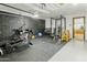Spacious garage converted into a home gym with modern fitness equipment at 1508 W Kiowa Ave, Mesa, AZ 85202