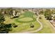 Panoramic aerial view of a lush golf course with manicured greens and scenic walking paths at 1508 W Kiowa Ave, Mesa, AZ 85202