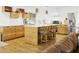 Modern kitchen featuring wood cabinetry, stainless steel appliances, and a spacious island at 1508 W Kiowa Ave, Mesa, AZ 85202