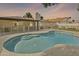 Stunning private backyard pool featuring secure fencing, perfect for outdoor relaxation and entertainment at 1508 W Kiowa Ave, Mesa, AZ 85202