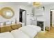 Bright salon featuring an adjustable medical bed, wooden flooring and mini fridge at 1508 W Kiowa Ave, Mesa, AZ 85202