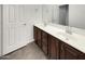 Spacious bathroom featuring double sinks, modern faucets, and stylish vanity at 15240 N 142Nd Ave # 2102, Surprise, AZ 85379