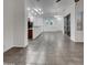 Open-concept living area with tile flooring, neutral paint, and access to the dining area at 15240 N 142Nd Ave # 2102, Surprise, AZ 85379