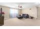 Neutral bedroom with plush carpeting and ample space for seating at 15856 N 76Th Ave, Peoria, AZ 85382