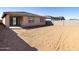 An empty backyard area awaiting personal touches for outdoor enjoyment at 16076 W Prickly Pear Trl, Surprise, AZ 85387