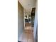 View of the tiled entryway leading to the living area and staircase in this home at 1706 W Village Way, Tempe, AZ 85282
