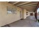 Covered patio with stucco walls and multiple windows at 1716 N Temple St, Mesa, AZ 85203