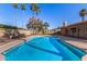 Backyard pool with landscaping and privacy fence at 1716 N Temple St, Mesa, AZ 85203