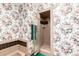 Bathroom features a shower and a floral wallpaper at 1934 E Hale St, Mesa, AZ 85203