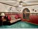 Inviting living room with a cozy futon, decorative touches, and stylish shutters for a warm atmosphere at 1934 E Hale St, Mesa, AZ 85203