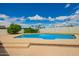 Backyard featuring a sparkling swimming pool with a spacious deck for sunbathing and outdoor enjoyment at 1934 E Hale St, Mesa, AZ 85203