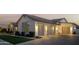 Exterior shot featuring a three car garage with an extra window on the end at 19901 E Country Meadows Dr, Queen Creek, AZ 85142