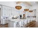 Spacious kitchen featuring a large island, modern appliances, and ample cabinet space at 19901 E Country Meadows Dr, Queen Creek, AZ 85142