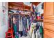 Well-organized walk-in closet provides ample storage with shelves and hanging space at 21557 N Anne Ln, Maricopa, AZ 85138