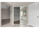 Bathroom with walk-in closet, vanity, and shower at 2319 E San Tan Dr, Gilbert, AZ 85296