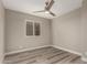 Bedroom with ceiling fan and bright natural light at 2319 E San Tan Dr, Gilbert, AZ 85296