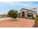 Charming single-story home with well-manicured desert landscaping and a welcoming entrance at 2319 E San Tan Dr, Gilbert, AZ 85296
