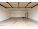 Garage with concrete floor and water heater at 2319 E San Tan Dr, Gilbert, AZ 85296