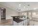 Open kitchen layout with a breakfast bar overlooking the living area, perfect for entertaining at 2319 E San Tan Dr, Gilbert, AZ 85296