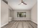 Open living room with large window providing plenty of natural light at 2319 E San Tan Dr, Gilbert, AZ 85296