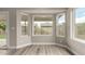 Bright sunroom featuring a wall of windows, perfect for relaxing and enjoying the view at 2319 E San Tan Dr, Gilbert, AZ 85296