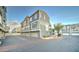 Exterior of a condo featuring a garage, windows, and neutral-toned paint at 2402 E 5Th St # 1532, Tempe, AZ 85288