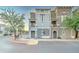 Exterior of a condo featuring a entrance, balcony, and neutral-toned paint at 2402 E 5Th St # 1532, Tempe, AZ 85288