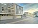 Exterior of a condo featuring a garage, windows, and neutral-toned paint at 2402 E 5Th St # 1532, Tempe, AZ 85288