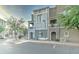 Exterior of a condo featuring a entrance, balcony, and neutral-toned paint at 2402 E 5Th St # 1532, Tempe, AZ 85288