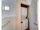 Bright laundry room with stacked washer and dryer and easy access at 2402 E 5Th St # 1532, Tempe, AZ 85288