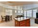 Spacious living room with dining area, carpet floors, and a ceiling fan at 2402 E 5Th St # 1532, Tempe, AZ 85288