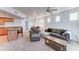 Inviting living room featuring neutral tones, plush seating, and an open layout to the kitchen and dining area at 2402 E 5Th St # 1532, Tempe, AZ 85288