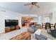 Comfortable living room with an open floor plan that includes the kitchen and dining area, perfect for entertaining at 2402 E 5Th St # 1532, Tempe, AZ 85288