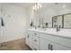 Bathroom includes a double sink vanity, lots of storage, and tile flooring at 2658 S Sulley Dr # 102, Gilbert, AZ 85295