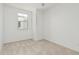 Cozy bedroom featuring neutral carpet and a window providing natural light at 2658 S Sulley Dr # 102, Gilbert, AZ 85295
