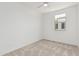 Bright bedroom with neutral carpet and a window providing natural light at 2658 S Sulley Dr # 102, Gilbert, AZ 85295