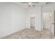 Bedroom featuring neutral carpet, ceiling fan, and closet at 2658 S Sulley Dr # 102, Gilbert, AZ 85295