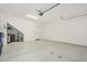 Spacious garage with epoxy floor, storage racks, and garage door opener at 2658 S Sulley Dr # 102, Gilbert, AZ 85295
