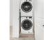 Efficient, modern stacked washer and dryer unit in a bright, clean laundry area at 2658 S Sulley Dr # 102, Gilbert, AZ 85295