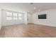 Bright living room has tile flooring and a wall mount for a TV at 2658 S Sulley Dr # 102, Gilbert, AZ 85295