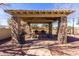 Community pavilion featuring stone columns, seating, and built-in grilling stations at 2658 S Sulley Dr # 102, Gilbert, AZ 85295